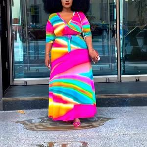 Elegant plus size V-neck wrap dress with vibrant rainbow gradient print and waist tie