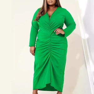 Bright green long-sleeve maxi dress with deep V-neck and slimming front ruched detail