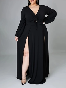 Detail of the sexy V-neckline with adjustable drawstring on this black plus size dress
