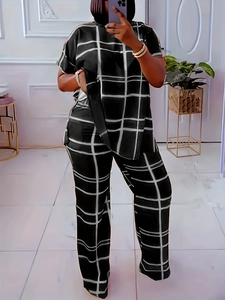 Detail view of women's two-piece set featuring black and white large grid print design
