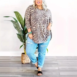 Women's plus size loose fit leopard print long sleeve top with casual blue ripped jeans