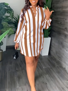 Brown and white vertical striped long sleeve shirt dress with a relaxed V-neck cut