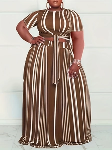 Women's plus size two-piece set featuring striped crop top and high waist wide leg pants