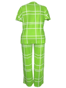Rear view of neon green two-piece set featuring white grid pattern on V-neck top and pants