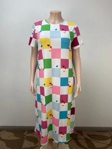 Detail view of colorful checkerboard and heart print on loose casual maxi dress