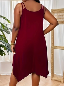 Detail of the back view of a wine red strapless dress featuring a low back design