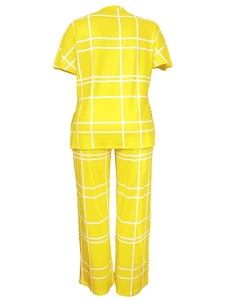 Rear view of vibrant yellow two-piece lounge set with large white grid pattern prints