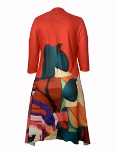 Detailed back view of a plus-size dress with red top and colorful geometric prints