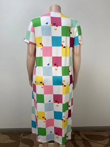 Rear view of a loose maxi dress featuring colorful plaid patterns and small heart prints