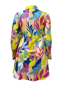 Back view of summer maxi dress with vibrant tropical leaf print and long sleeves
