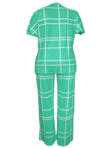 Flat lay of green and white plaid loungewear set featuring short sleeve top and trousers