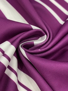 Detailed macro view of purple and white striped knit fabric with breathable mesh texture