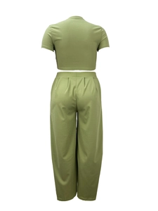 Rear view of grass green two-piece set featuring cropped top and high-waist wide-leg pants