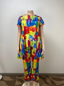 Detail of colorful abstract print lounge set with side slit top and matching pants