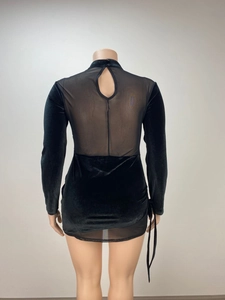Detail of sheer mesh back and velvet splicing on long sleeve bodycon black mini dress