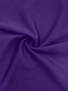 Detailed macro view of soft dark purple knit fabric with natural draped spiral texture