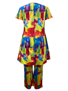 Detail of colorful abstract graffiti print two-piece set with long top and trousers