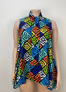 Detail of colorful geometric print sleeveless dress with chic neck tie and A-line silhouette