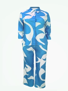 Detailed view of the blue and white abstract geometric print on this two-piece loungewear set