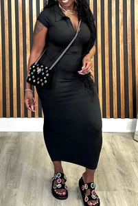 Detail of the high-elastic knitted fabric and lapel collar on this black bodycon dress