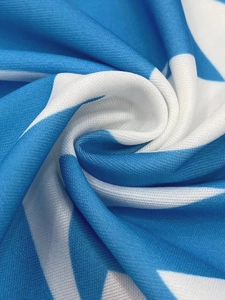 Detailed macro view of the breathable blue and white mesh fabric texture and pattern