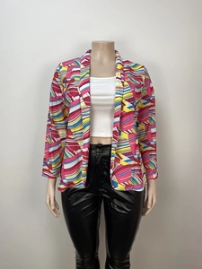 Detail view of colorful geometric print patterns on this stylish oversized blazer jacket