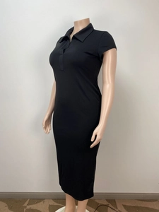 Detail of a black midi dress featuring a polo collar and slim-fit knitted texture