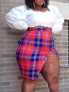 Plus size summer outfit with white puff sleeve top and red blue plaid slit skirt