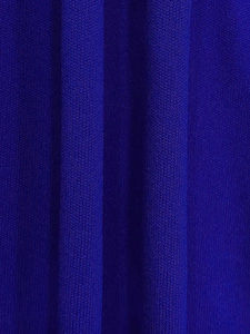 Close-up of high-quality navy blue knitted fabric showing fine texture and soft drape