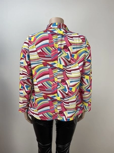 Detailed back view of casual oversized blazer with bold colorful geometric abstract print
