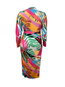 Detail of vibrant tropical leaf print maxi dress with long sleeves and pink waist tie back