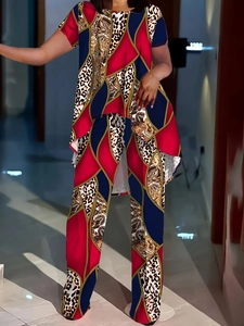 Women's two-piece casual set featuring geometric print top and matching wide leg pants