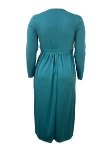Detail view of the back of a peacock blue long sleeve maxi dress with pleated waistline