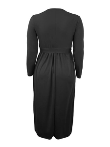 Back view of a long-sleeved black midi dress with waist slimming cut and pleated skirt detail