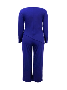 Detail of royal blue lounge set showing the asymmetrical hem and soft knit fabric texture