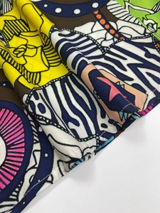 Macro shot of pop art illustration print on heavy twill fabric with neat hemmed edges