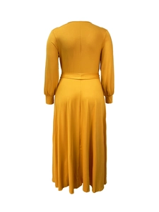 Rear view of yellow V-neck maxi dress with high waist cut and graceful drape detail