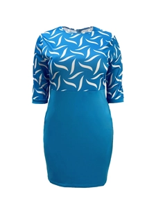 Detail view of royal blue dress featuring white wave patterns and patchwork design
