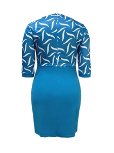 Detail showing the back invisible zipper and stitching on the slim fit paneled dress