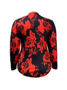 Rear view of long sleeve V-neck top featuring bold red floral print on a black base