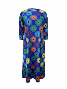 Close-up of vibrant royal blue maxi dress featuring colorful geometric polka dot print