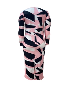 Detail of geometric abstract print on long sleeve dress with rear slit and slim fit cut