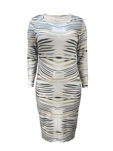 Detailed view of women's long sleeve slim fit dress with black and gold zebra animal print