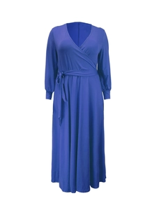 Detail of royal blue V-neck wrap dress with long sleeves and adjustable waist tie