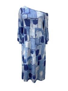 Detail of one-shoulder long sleeve dress featuring casual blue denim patchwork print