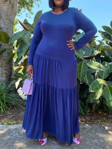 Women's dark blue long sleeve tiered maxi dress with crew neck and pleated design