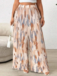 Women high waist wide leg trousers with abstract print and pleated texture in earth tones