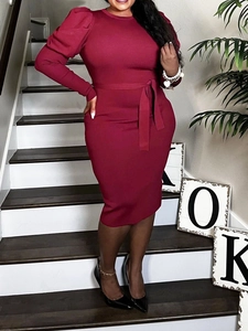 Elegant burgundy long sleeve midi dress with puff shoulders and a waist tie belt