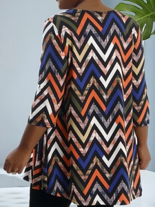 Women's plus size long top featuring multi-color chevron pattern and loose fit design