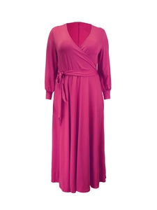 Detail of fuchsia V-neck maxi dress with long sleeves and elegant wrap waist tie